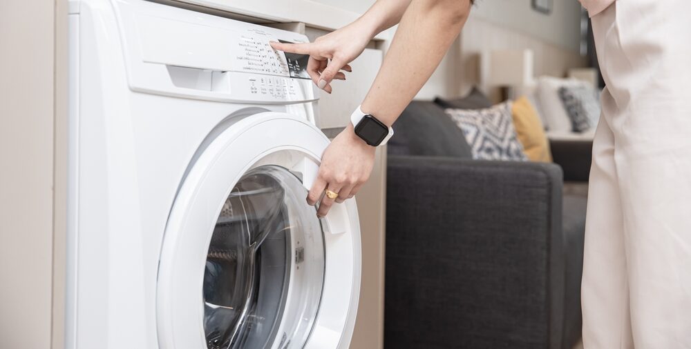 woman opening dryer